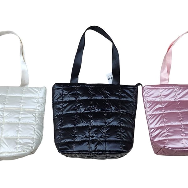 modacool-cartera-puffer-matelaseada-surtida-fondo-blanco.jpg