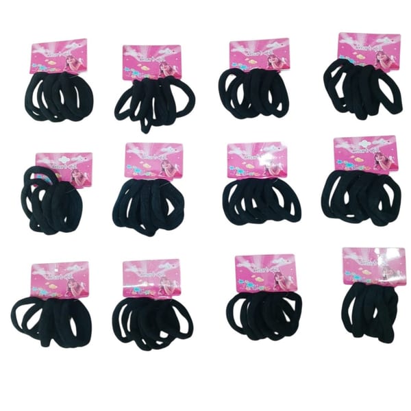 Tarjetas exhibidoras de la marca Smart Girl con colitas para el pelo color negro.