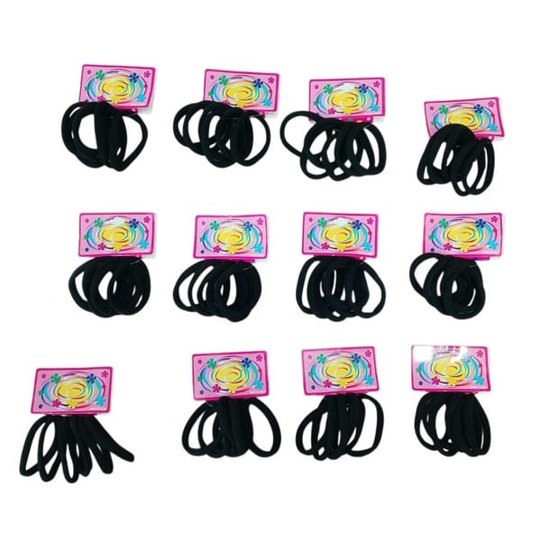 Set de tarjetas con colitas de pelo elásticas negras organizadas sobre una superficie clara.