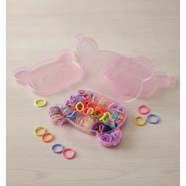 Caja organizadora con forma de osito transparente rosa llena de colitas y gomitas para el pelo de colores