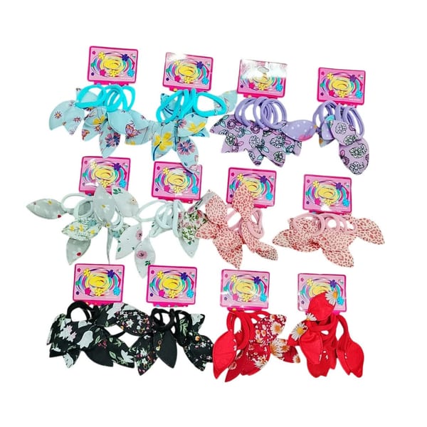 Tarjetas exhibidoras con surtido de colitas de pelo con lazos elásticos de colores y estampados variados