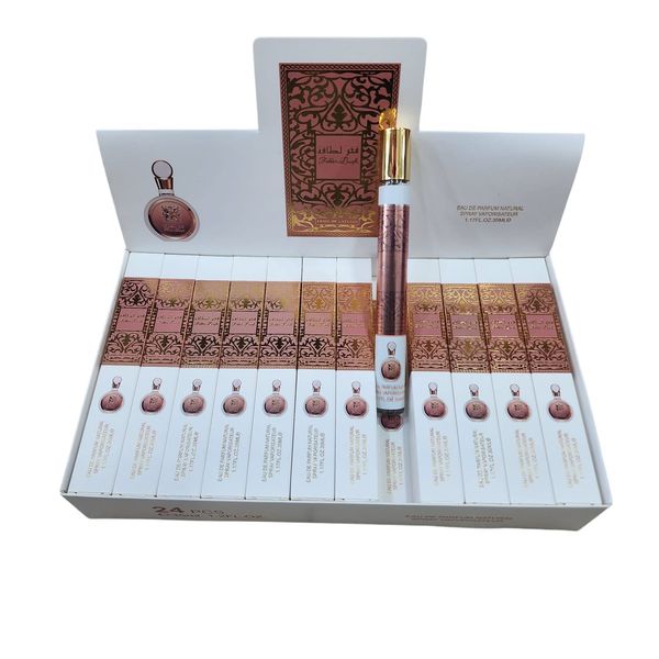 Caja exhibidora abierta con 24 unidades de perfume en tubo de bolsillo Fakhar Lattafa de 35 ml