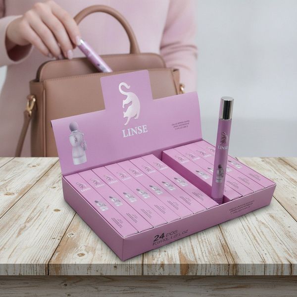 Caja exhibidora con perfumes de bolsillo marca Linse en tonos rosa