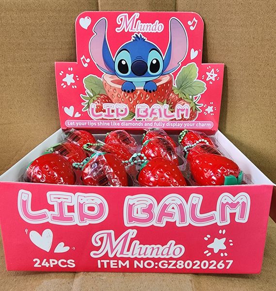 Caja exhibidora con 24 bálsamos labiales en envase con forma de frutilla