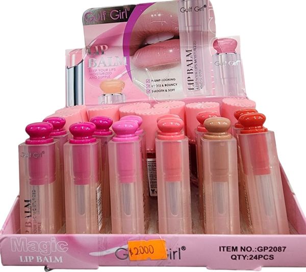 Caja exhibidora exhibiendo 24 bálsamos labiales Gulf Girl Magic en tonos rosa y nude.