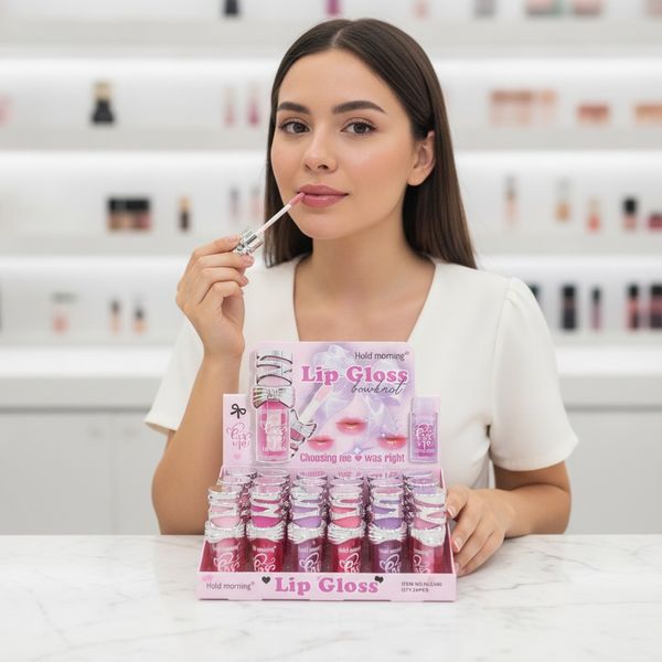 Exhibidor con brillos labiales Hold Morning con tapas en forma de moño plateado