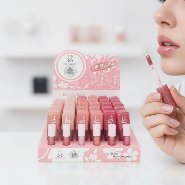 Caja exhibidora rosa con 36 brillos labiales marca Venus Queen en distintos tonos.