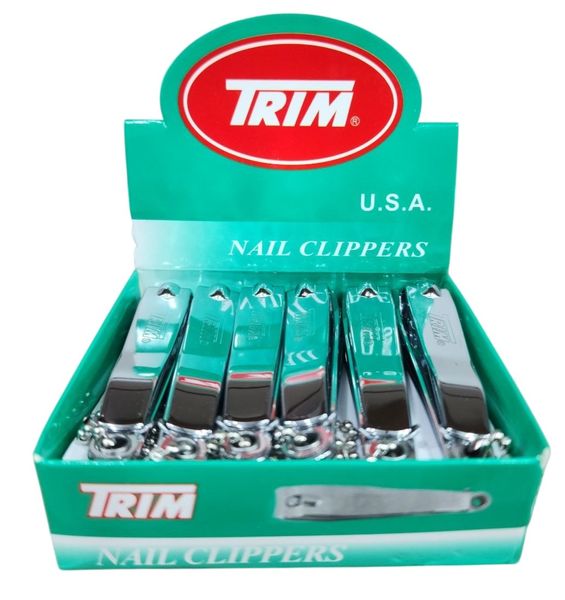 Caja exhibidora verde con corta uñas metálicos marca Trim