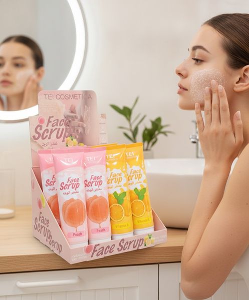 Exhibidor comercial con tubos de exfoliante facial TEI Cosmética variedades Peach y Vitamin C.