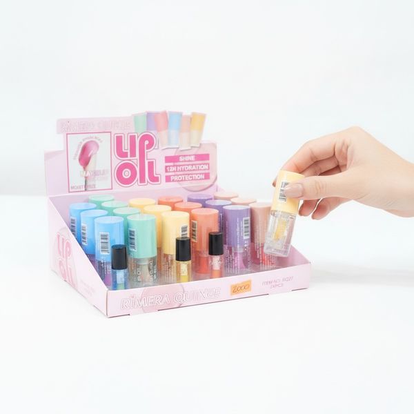 Caja exhibidora con 24 unidades de Lip Oil Rimera Quince en colores surtidos