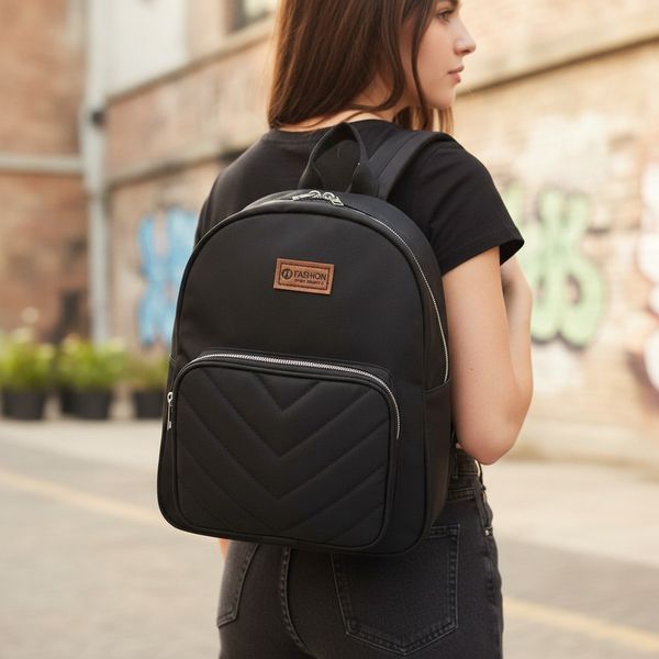 Mochilas urbanas negras para mujer con cierres y bolsillos frontales