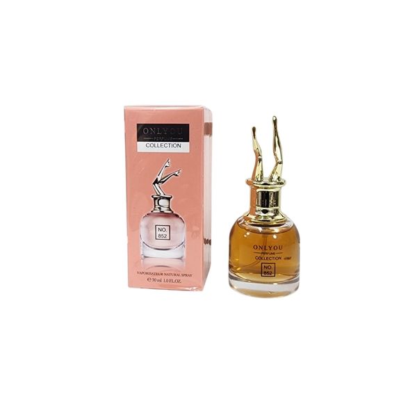 Frasco de perfume Onlyou No. 852 con tapa dorada junto a su caja rosa