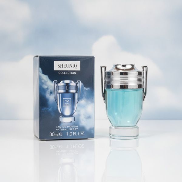 Frasco de perfume Sheuniq Collection No 620 junto a su caja