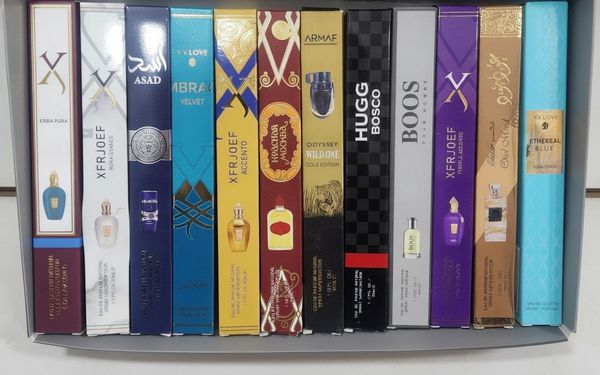 Caja exhibidora con 12 perfumes mini surtidos de 35 ml en sus envases individuales