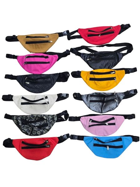 Variedad de riñoneras de diversos colores y materiales organizadas en filas.