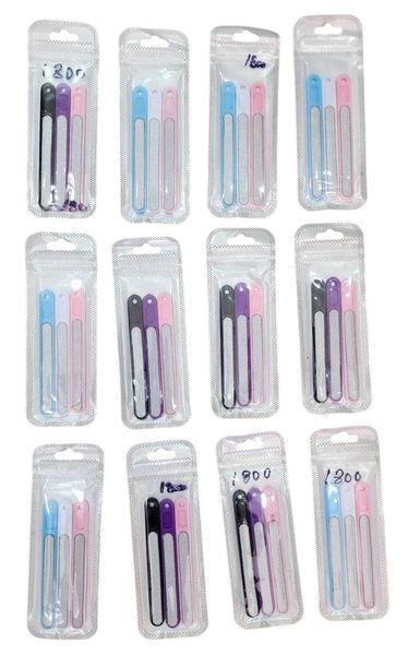 Paquetes individuales con tres limas de uñas de colores cada uno