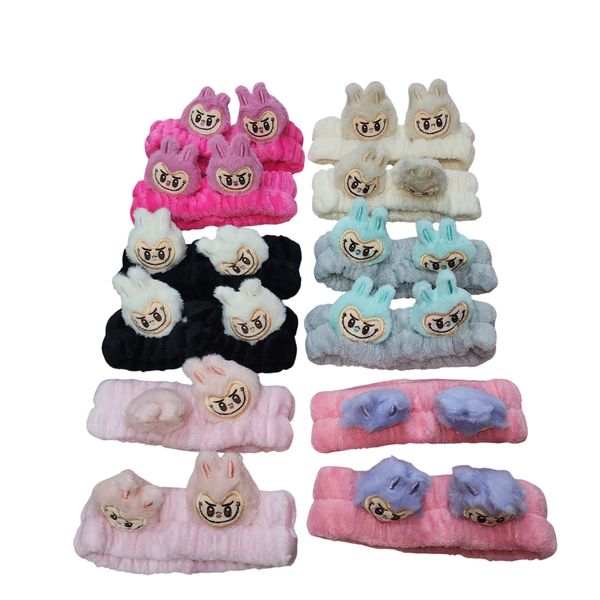 Vinchas de peluche suaves en varios colores con apliques de caritas animadas