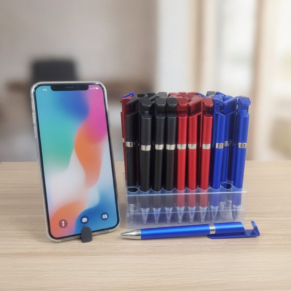 Exhibidor transparente con lapiceras negras, rojas y azules con clip soporte para celular.