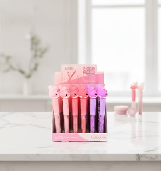 Caja exhibidora de brillos labiales con luz Skora Light Gloss en tonos rosa y violeta con figura de narval