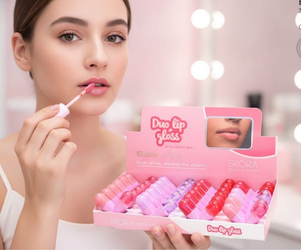 Caja exhibidora de brillos labiales dobles Duo Lip Gloss marca Skora en tonos surtidos