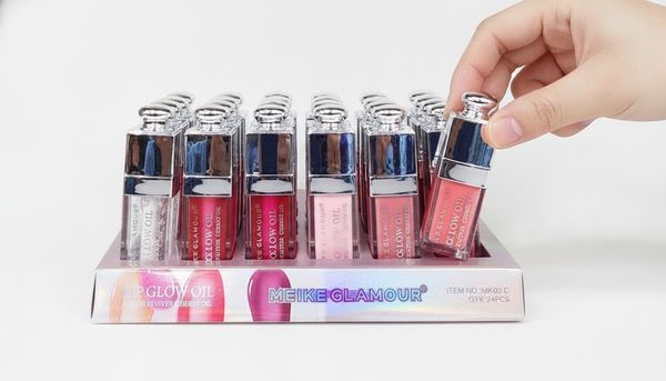 Caja exhibidora con 24 unidades de brillo labial Lip Glow Oil Meike Glamour en tonos surtidos