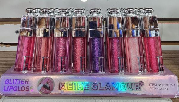 Caja exhibidora de 32 brillos labiales con glitter Meike Glamour en tonos surtidos.
