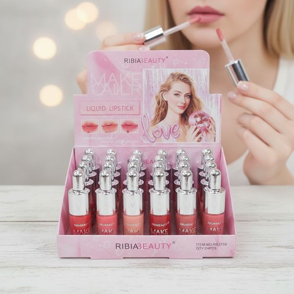 Caja exhibidora de 24 labiales líquidos Ribia Beauty con envase transparente y tapas plateadas