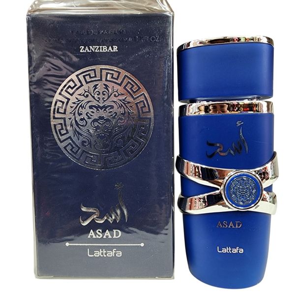 Perfume Lattafa Asad Zanzibar en frasco azul con detalles plateados junto a su caja original