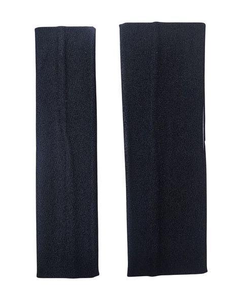 Dos vinchas elásticas de tela color negro dispuestas sobre una superficie plana